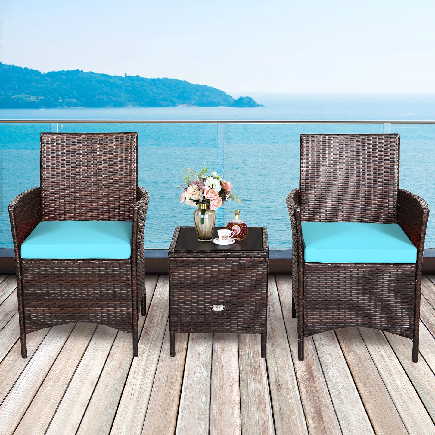 3 PCS Rattan Furniture Set with Cushions and glass top table.